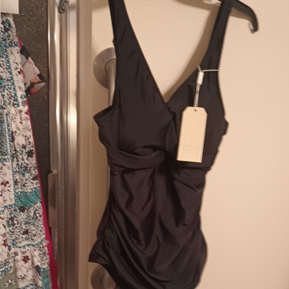 A New Elegant Black Swimsuit. Size L  By Heytalala